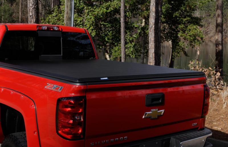 Lund 02-17 Dodge Ram 1500 Fleetside (6.4ft. Bed) Hard Fold Tonneau Cover – Black
